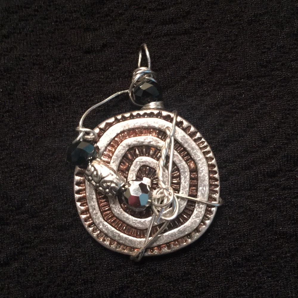 Handcrafted pendant.